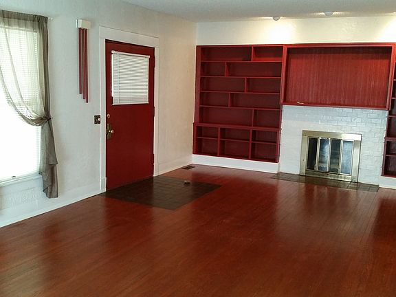 Living Room Front Door and Bookshelf Wall