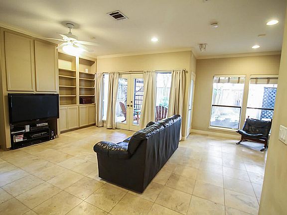 Over-sized room may be used for media room, bedroom, work area or more.