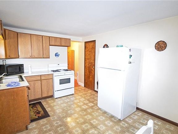 Kitchen of 1BR unit on first floor.
