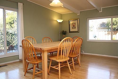 Fabulous Dining Room With Dual Pane Picture Windows, Hardwood Flooring and Views!