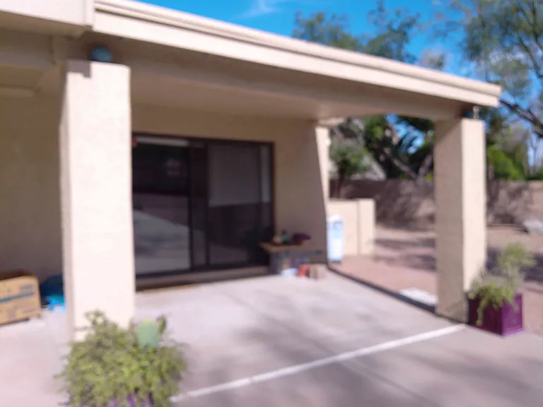 Covered patio, kitchen entrance