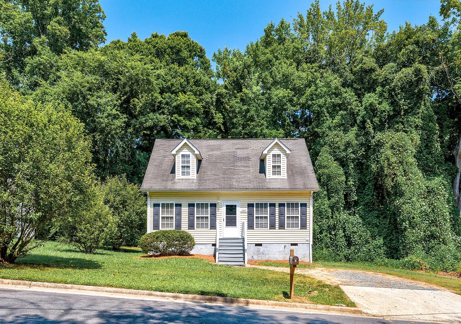 NE Two Story Home, Several Updates, Wood like flooring downstairs, Ceiling Fans, Deck, Must See! — Photo 1