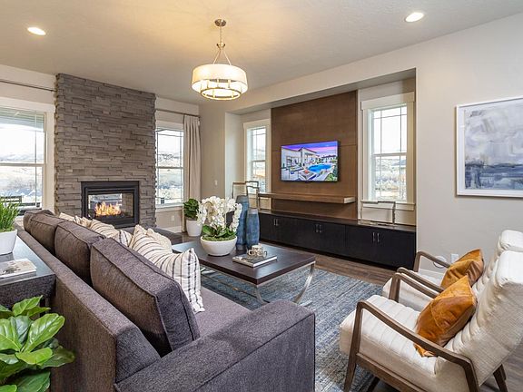 Generous great room accented by an elegant fireplace