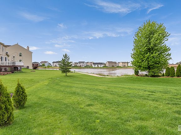Premium lot with pond view & access to walking trails.