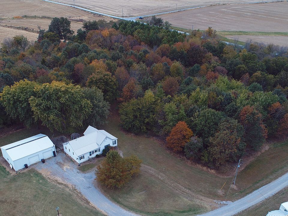 Paved road leading to property