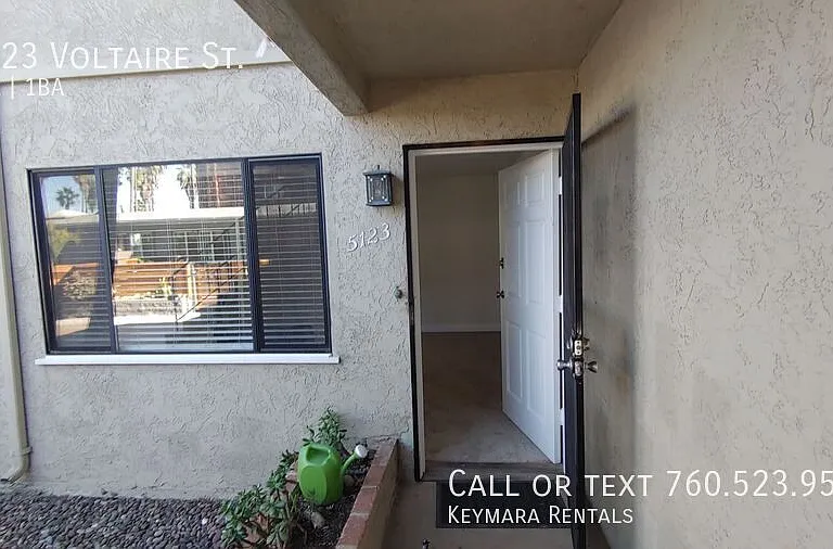 5123 Voltaire St — Photo 4
