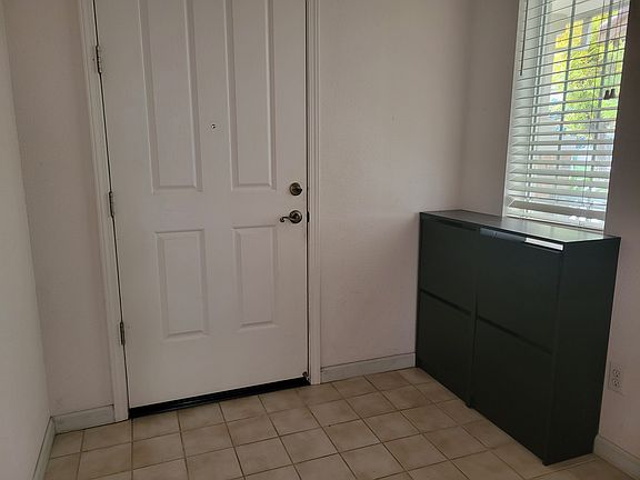 entryway with built in shoe racks