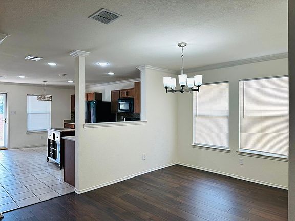 4th image of 704 White Fields Way