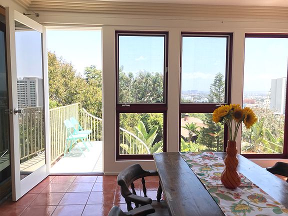 Bridge to spiral stairs leading to back garden