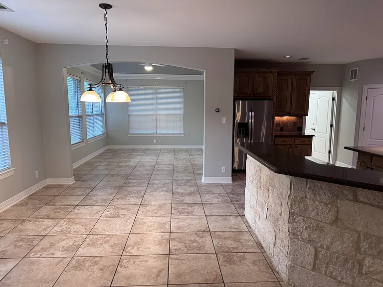 Breakfast nook next to family room/sun room.