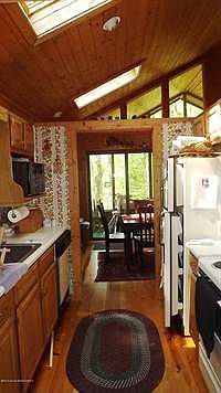 galley style kitchen with skylights