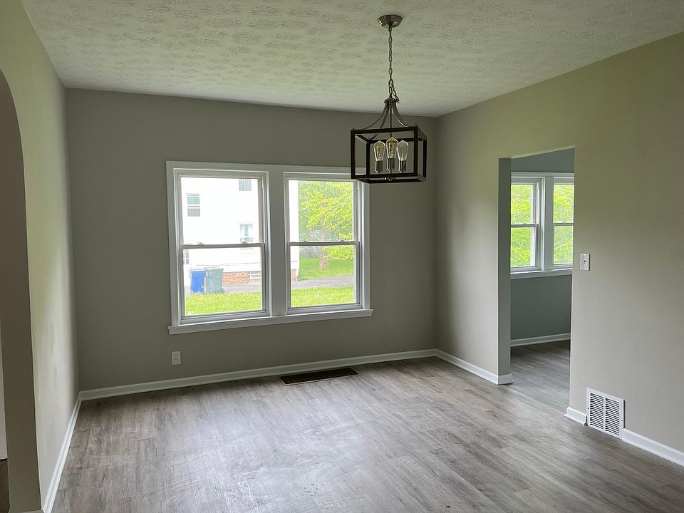 Dining room looking towards kitchen (right) and living room (left)
