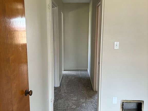 Hallway from living space to kitchen and bath.