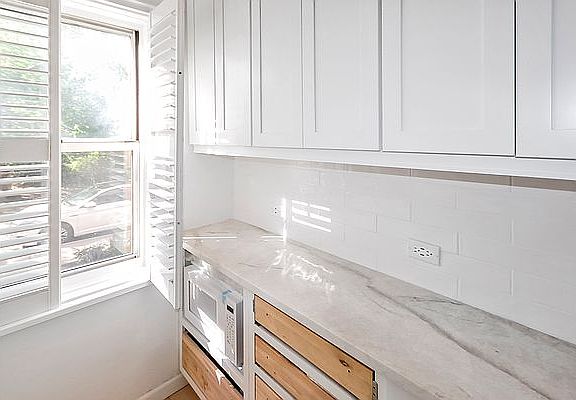 5th image of 5444 Arlington Ave APT G13