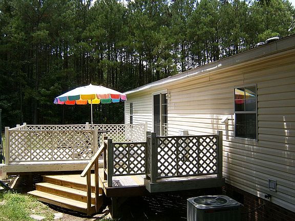 Rear deck is 12'x15',9'x5' with lattice railing.