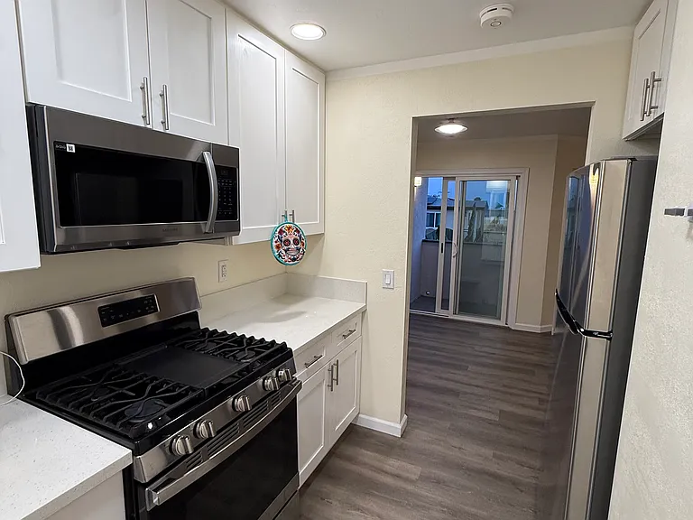 Kitchen with new stainless appliances