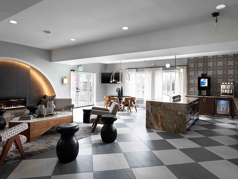 Resident lounge with fireplace and lounge seating