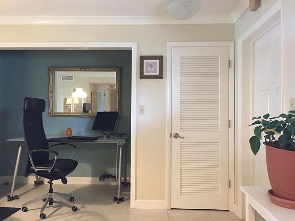Entry, closet & desk alcove.