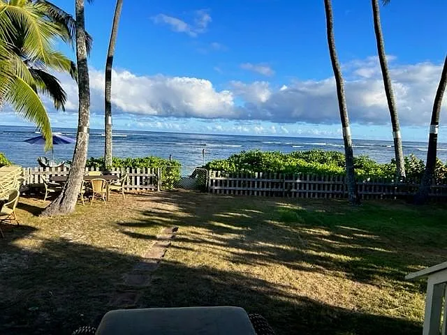 Lanai and path through gate to the beach