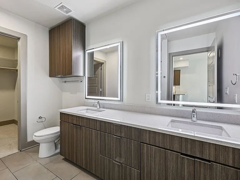 Dual Vanity Sinks and Granite Countertops