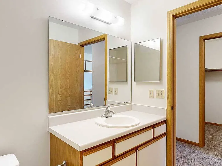 Start and end your day in a bright, private bathroom with plenty of counter space.