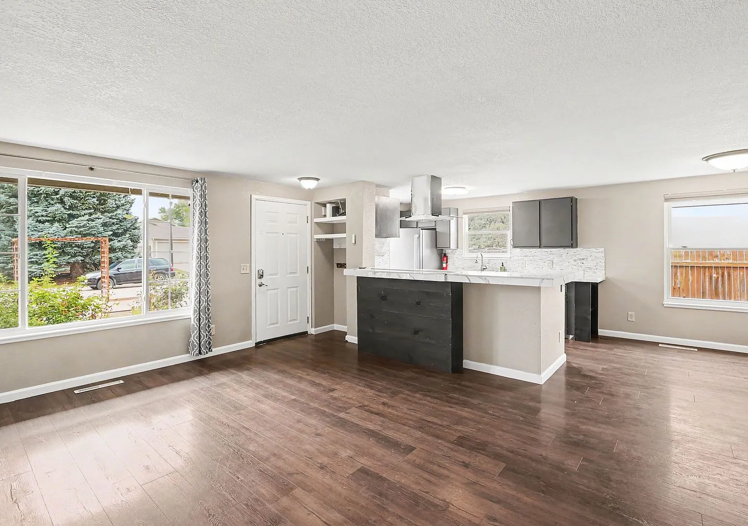 Spacious 4-Bedroom Home with Mother-in-Law Suite in Poudre School District Available Now! — Photo 3