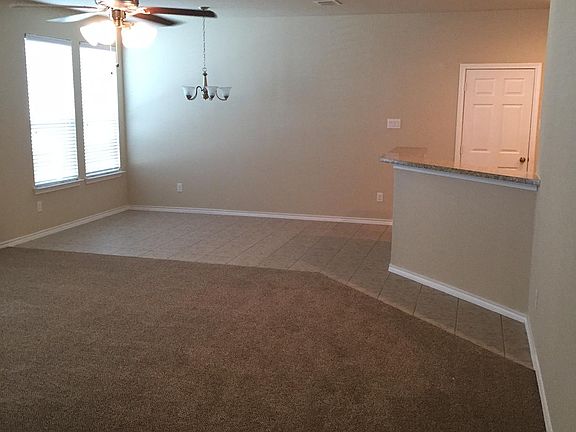 Giant open great room, dining area and kitchen...perfect for family gatherings and entertaining