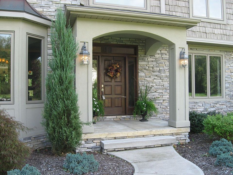 Beautiful stacked stone graces the front of the home.