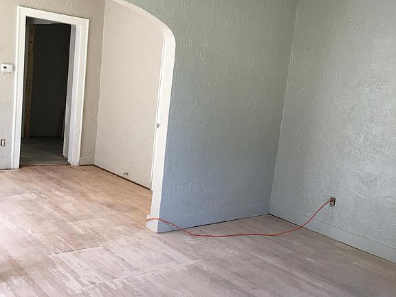 Living room/ dining room floors being restained
