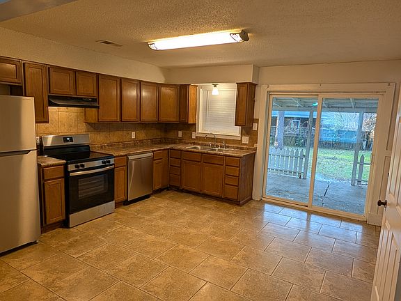 Kitchen with sliding door to the back patio