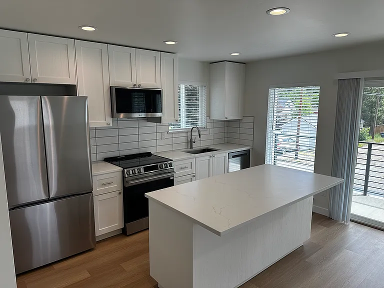 Kitchen with new appliances.