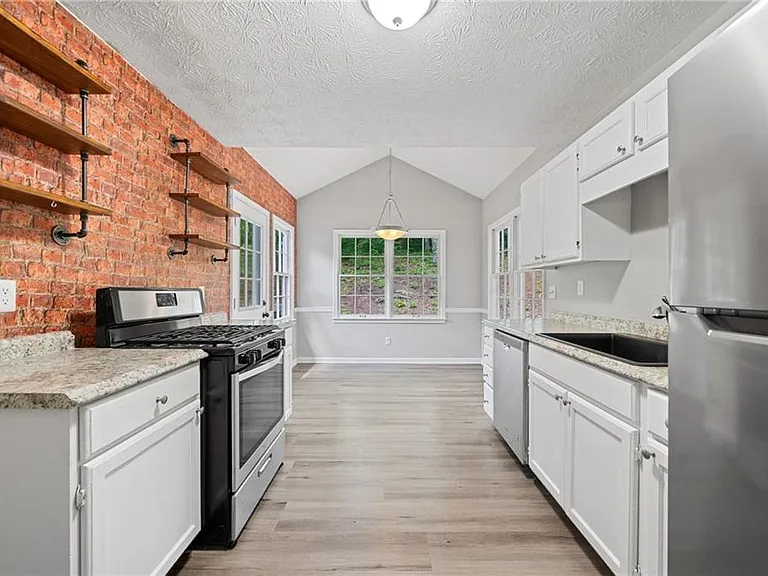 5590 Princeton Oaks Dr — Photo 18