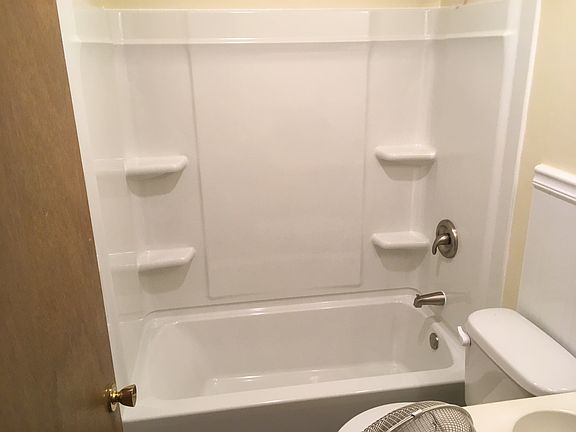 Full bath in hall with updated tub/shower combo