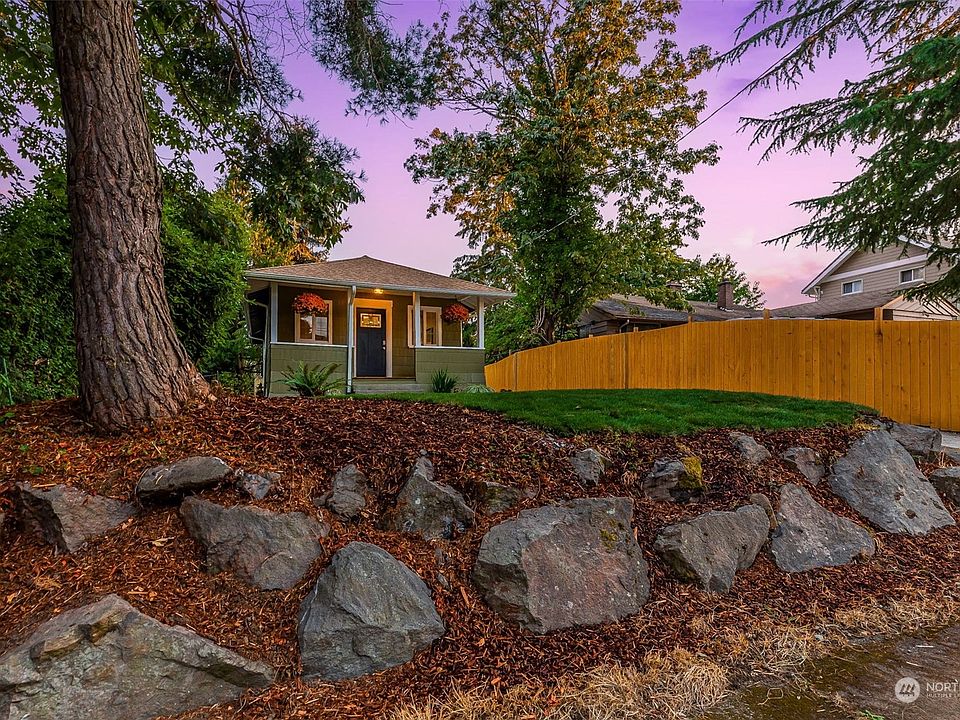 Set back off Austin Street in desirable Brighton neighborhood with its own off street parking spot in back!>