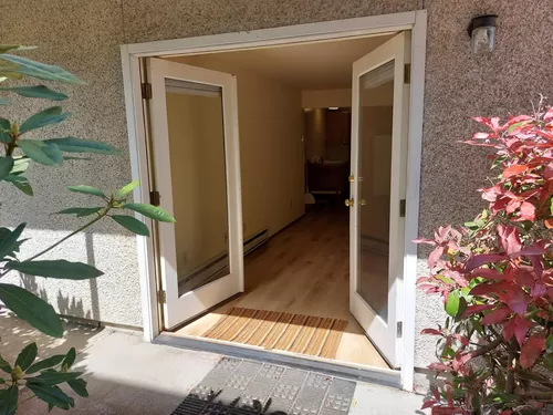 Welcome. Outside of the unit - french doors. - 3311 NE 65th St #11