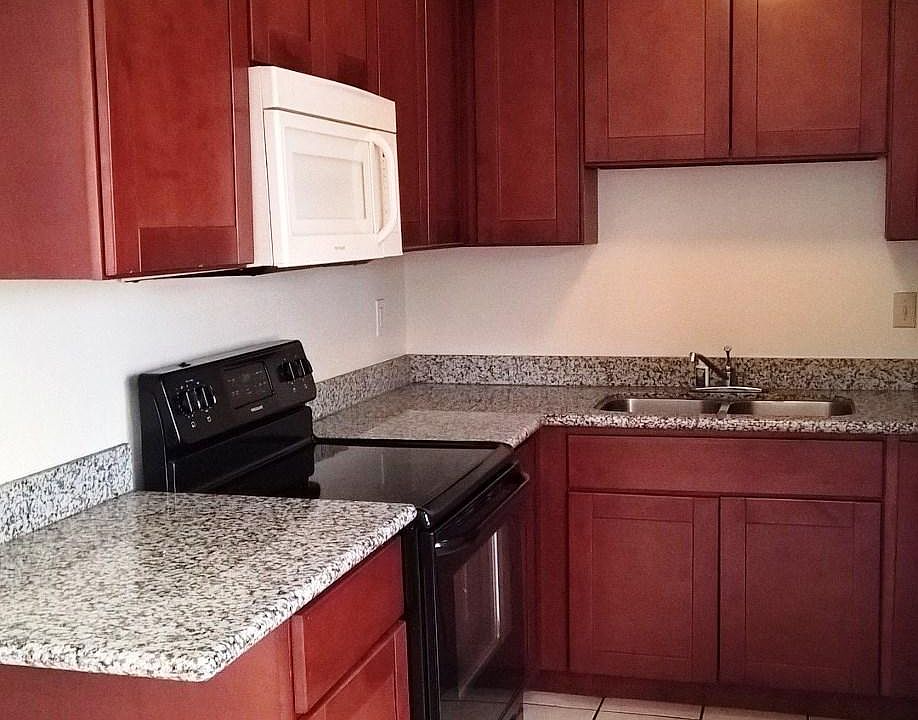 UNIT B - Updated kitchen with granite countertops