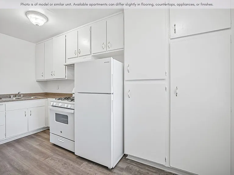 Well-designed kitchen offering ample storage, natural light, and a clean, functional layout.