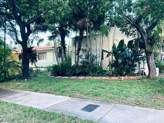 Beautifully Manicured Front Lawn of this Gorgeous Coral Gables Art Deco Home