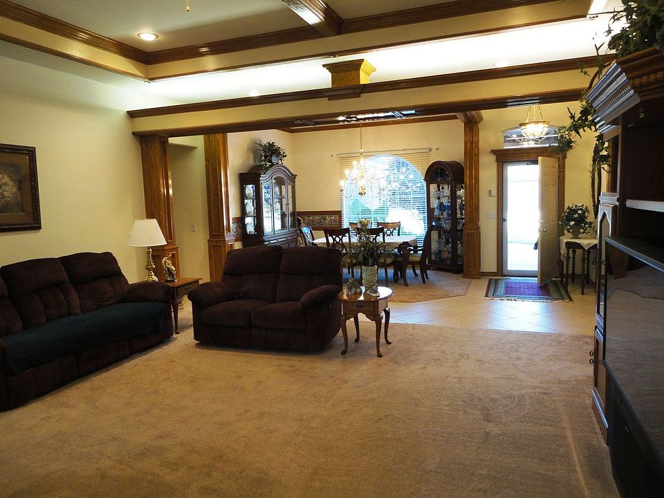 View looking from living toward entry and formal dining.