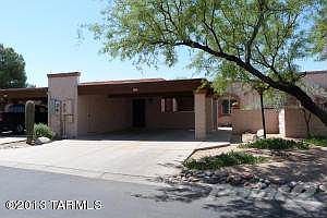 2-car carport with large storage closets