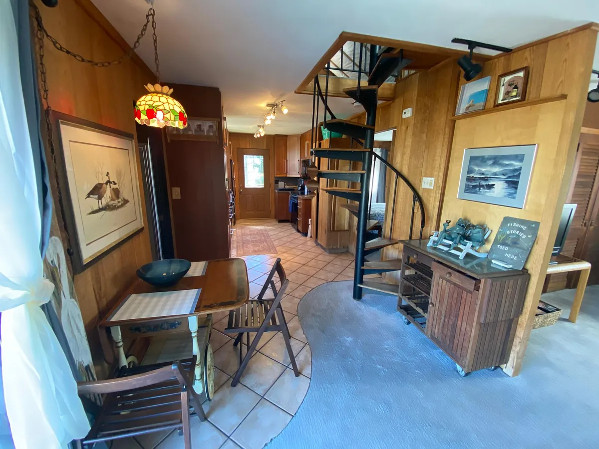 View from living room toward kitchen and front door. - 2070 Fairfield Beach Rd