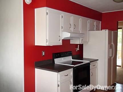 Kitchen
						:
						Hardwood floors, solid surface countertops