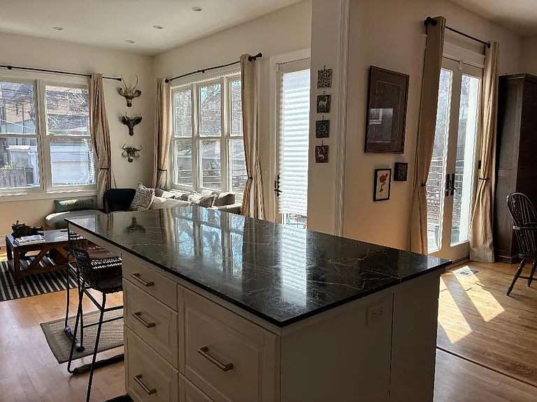 from kitchen into family room overlooking back garden