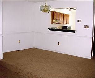 Raised dining room next to living room