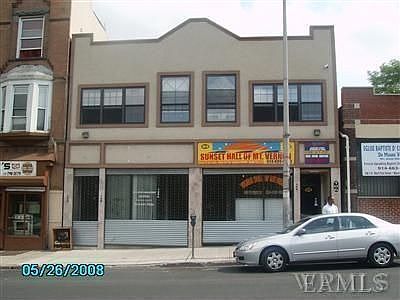 1st image of 106 W 1st St