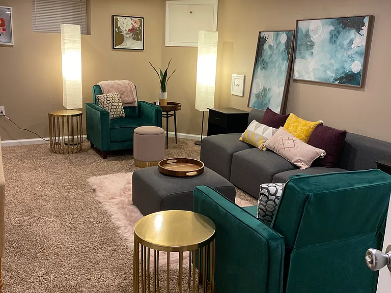 Basement den with bathroom attached.