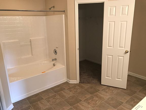 Large master bath with two walk in closets