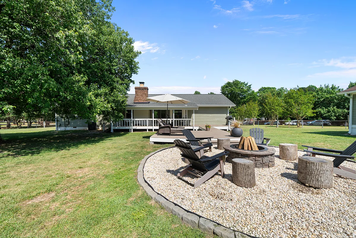Firepit - lounging area - extended back porch - 6108 Hope Ln