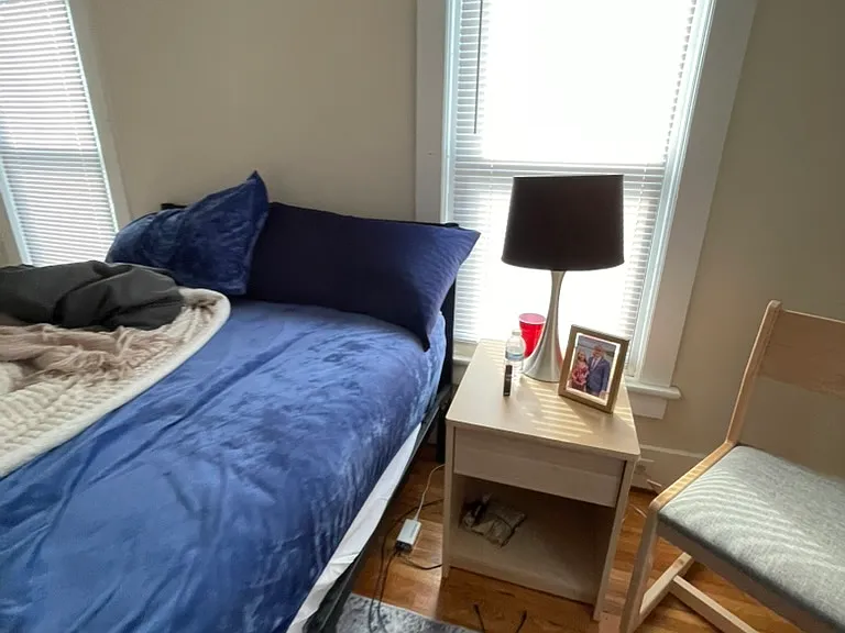 Bedroom 1: Our NEW furniture; photo shows student belongings.