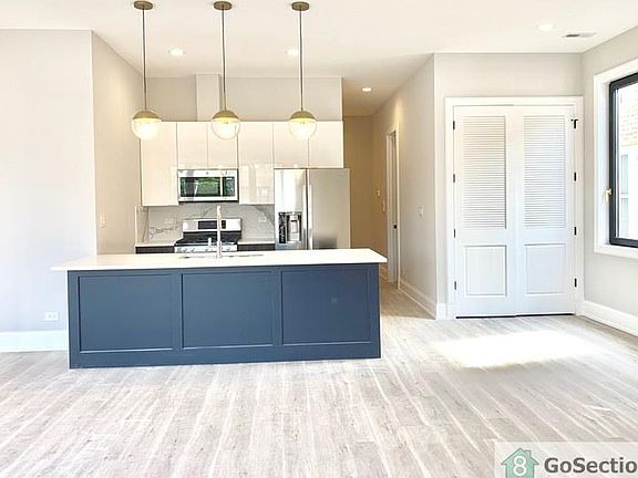 2nd image of 6126 N Mozart St #1F